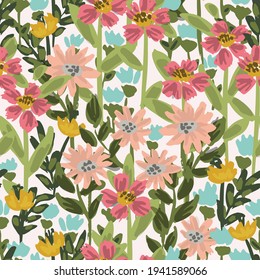 A dense meadow of wildflowers in pink, blue, yellow, and green on white. Beautiful millefleur spring-summer seamless vector pattern. Great for home decor, fabric, wallpaper, gift-wrap, stationery, etc