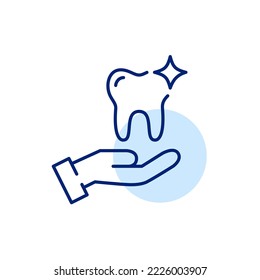 Dental care icon. Shining healthy tooth in hand. Pixel perfect, editable stroke line