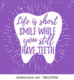 Dental care motivational quote poster. Dentist Day greeting card template. Typography lettering design on a tooth shape grunge texture and sunburst for print, t-shirt. Smile while you have teeth