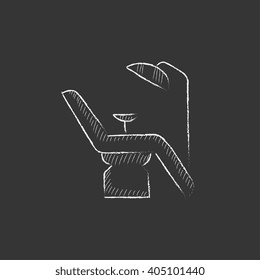 Dental chair. Drawn in chalk icon.
