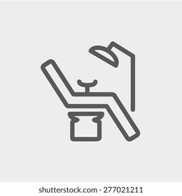 Dental chair icon thin line for web and mobile, modern minimalistic flat design. Vector dark grey icon on light grey background.