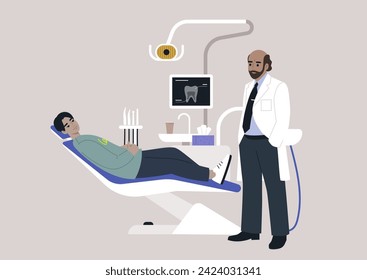 In a dental clinic, a patient sits in a dentist chair surrounded by various tools, including a monitor displaying an x-ray image, they engage in a discussion about the treatment plan with a doctor