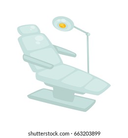 Dentist chair with standing lamp isolated on white