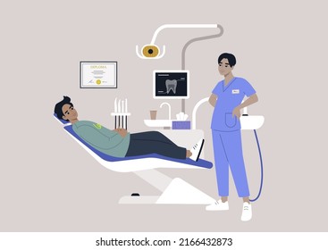 A dentist chair and tools, a monitor with an x-ray image, drills and other instruments in a stomatology cabinet