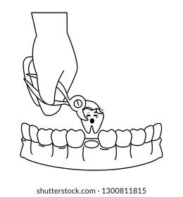 dentist extracting tooth with pliers