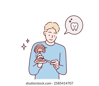 Dentist showing on a jaw model how to clean the teeth with tooth brush properly and right. Hand drawn style vector design illustrations.	