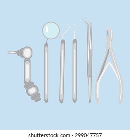 dentist tools on light blue background