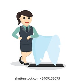 dentist woman standing beside big tooth