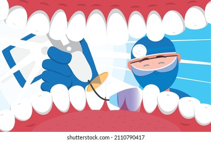 Dentist at work. The dentist treats teeth and puts dental fillings.