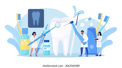 Dentists cleaning and treating big unhealthy tooth with caries cavity. Toothache. Stomatology, Dentistry concept. Doctors with professional instruments for check up and treatment. Dentist appointment