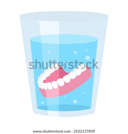 Denture in water. False removable teeth gum prosthesis in clean water, teeth cleaning dental care treatment.