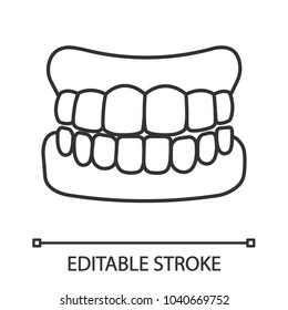 Dentures linear icon. False teeth. Thin line illustration. Human jaw with teeth model. Contour symbol. Vector isolated drawing. Editable stroke