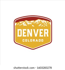 Denver colorado mountain range with vintage style badge