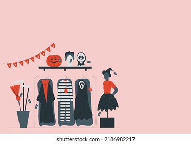 Department store with Halloween costumes. decorations and costumes displayed. Halloween Masks in a retail store. Sale products arranged on shelves.