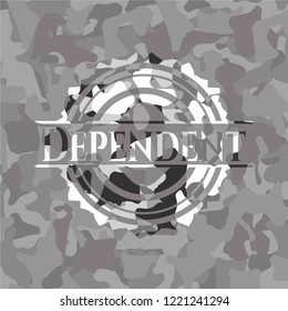 Dependent written on a grey camouflage texture