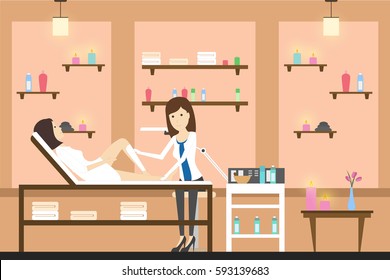 Depilation in spa center. Cosmetologist does epilation of legs in salon.