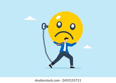 Depressed businessman carries burdened sad face with heavy chain, illustrating weighed down by stress, anxiety, negative emotions. Concept of anger, overwhelm, overworked, mental health or depression