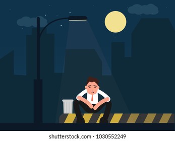 Depressed businessman sitting with street lamp on of the night city
