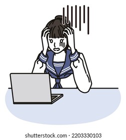 depressed female junior high school or high school students in sailor-style school uniform  looking at the computer screen