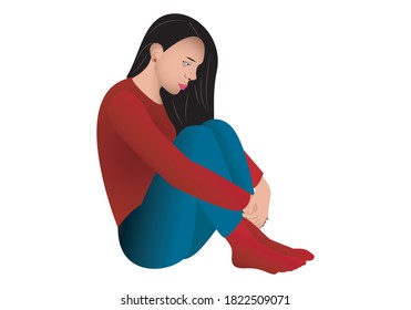 
Depressed girl sitting on the floor with her knees bent holding them on depression day