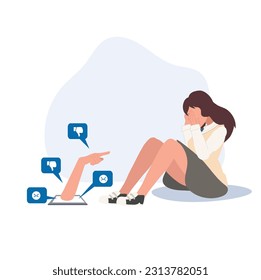 Depressed lonely young student woman, a victim of Internet bullying, is sitting in front of a phone, covering her face with her hands.Victim of mass media, cyber-bullying, online violence