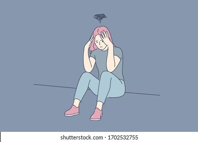 Depression, fatigue, mental stress, frustration concept. Young depression frustrated woman or girl teenager sitting on floor at home. Fatigue, raising of mental stress because of headache or bad news.