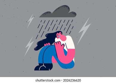 Depression, grief and loneliness concept. Young sad depressed woman sitting on ground crying with rain and storm with thunder above vector illustration 