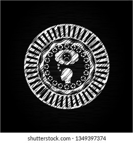 depression icon inside chalkboard emblem on black board