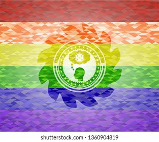 depression icon inside emblem on mosaic background with the colors of the LGBT flag