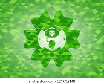 depression icon inside green emblem with mosaic background