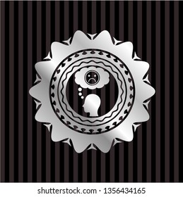 depression icon inside silvery emblem or badge