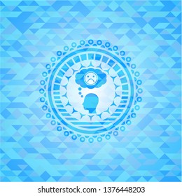 depression icon inside sky blue emblem with triangle mosaic background
