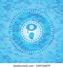 depression icon inside sky blue mosaic emblem