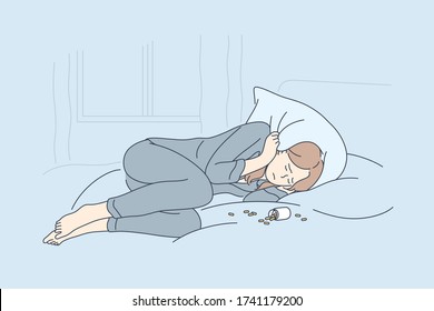 Depression, overdose, frustration, addiction concept. Depressed unhappy frustrated young woman lying on bed with opened bottle of pills. Suffering from insomnia or mental stress psychological problem.