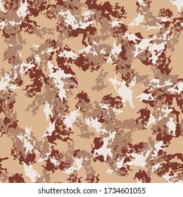 Desert camouflage of various shades of brown, white and beige colors. It is a colorful seamless pattern that can be used as a camo print for clothing and background and backdrop or computer wallpaper