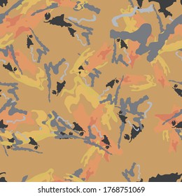 Desert camouflage of various shades of orange, grey and yellow colors. It is a colorful seamless pattern that can be used as a camo print for clothing and background and backdrop or computer wallpaper