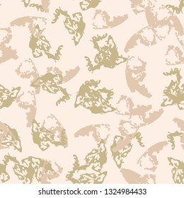 Desert camouflage of various shades of white, beige and green colors. It is a colorful seamless pattern that can be used as a camo print for clothing and background and backdrop or computer wallpaper