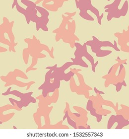 Desert camouflage of various shades of yellow, red and orange colors. It is a colorful seamless pattern that can be used as a camo print for clothing and background and backdrop or computer wallpaper