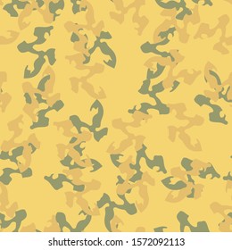 Desert camouflage of various shades of yellow, orange and green colors. It is a colorful seamless pattern that can be used as a camo print for clothing and background, backdrop or computer wallpaper