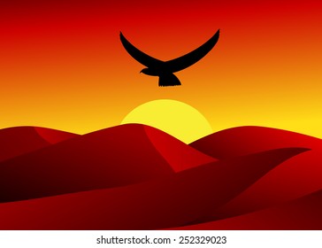 desert. The red sky, dunes in the desert and a bird