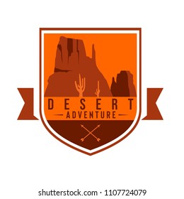 Desert in a shield logo with rocky mountains, cactus, and ribbon, suit for marketing materials, tourism organizations, outdoor events and camping leisure