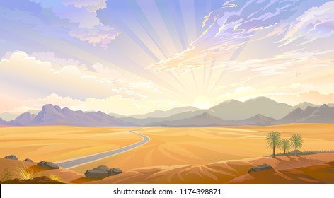 The desert view over the hill. Sunrise behind the mountains and a road across the desert. - Shutterstock ID 1174398871