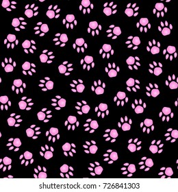Design background. Pink traces of paws on a black background. Seamless pattern