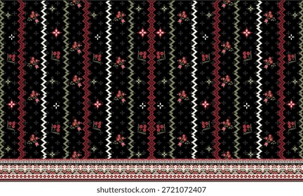 El diseño es un patrón de tela negra con motivos bordados a rayas de Vertical de líneas en zig-zag alternando con grupos florales y acentos de estrellas de cuatro pétalos. El borde inferior tiene un borde decorativo con detalles geométricos rojos, blancos y verdes.