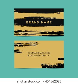 Design business card template. The card with the decor of abstract grunge spots. Universal design template business card with ink spots in a minimalist fashion style.