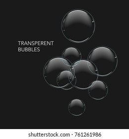 Design of a card with soap bubbles on a black background