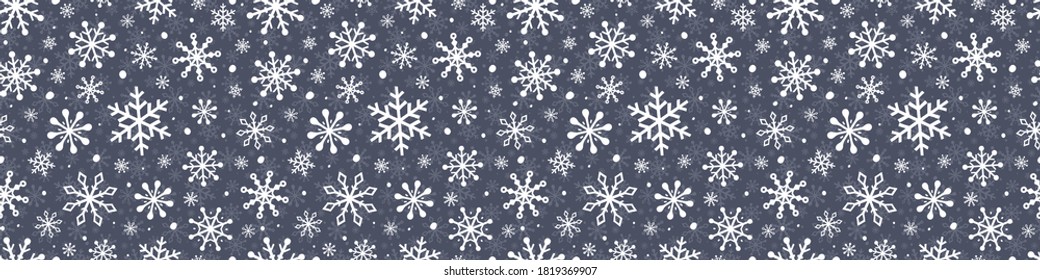 Design of Christmas background with festive snowflakes. Seamless pattern. Vector