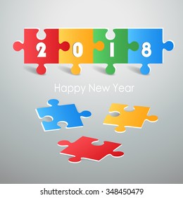 Design colorful puzzle, Happy new year 2018 greeting card