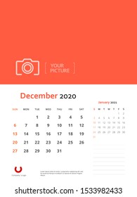 Design concept and idea layout December 2020 wall calendar stationary template. Corporate and business template design. Orange color and minimalistic style. Vector illustration. Isolated background.