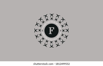 Design of a creative round monogram with the letter of the alphabet F. Abstract logo of a restaurant, hotel, business. Can be used for invitations, booklets, postcards.